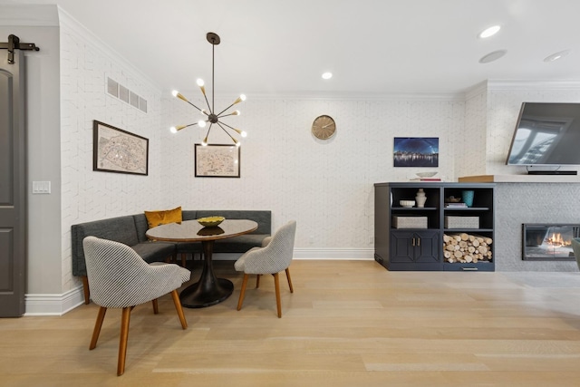 1924 N Wolcott Ave, Chicago, IL 60622 - dining room featuring wood finished floors, crown molding, baseboards, a chandelier, and recessed lighting