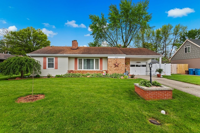 503 E Cedar Ln, Monticello, IL 61856 - single story home featuring an attached garage, concrete driveway, a chimney, and brick siding