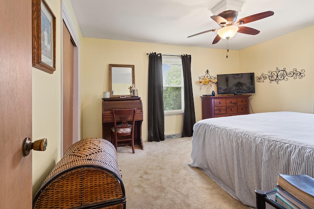 503 E Cedar Ln, Monticello, IL 61856 - bedroom with light colored carpet, ceiling fan, and a closet