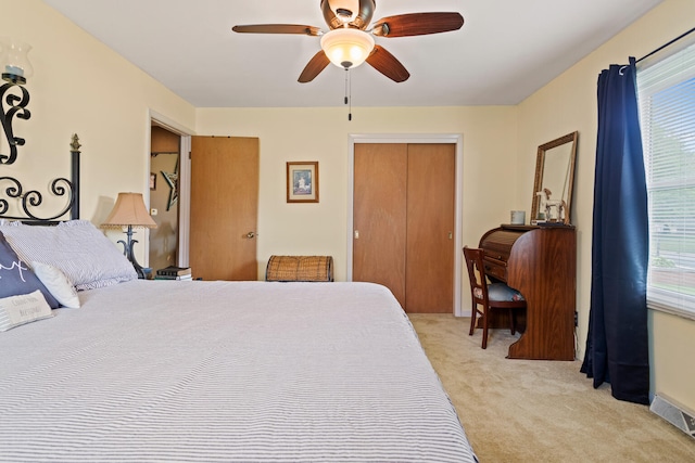 503 E Cedar Ln, Monticello, IL 61856 - bedroom featuring light carpet, multiple windows, a closet, and ceiling fan