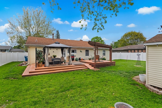 503 E Cedar Ln, Monticello, IL 61856 - rear view of property with a gazebo and a wooden deck