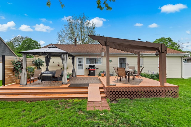 503 E Cedar Ln, Monticello, IL 61856 - rear view of house featuring a gazebo, a pergola, outdoor dining area, and a deck