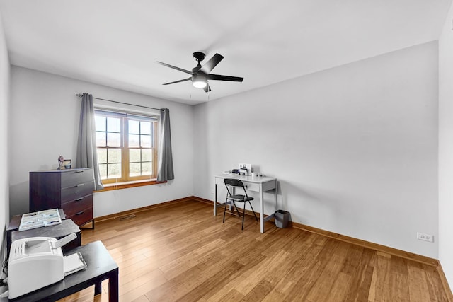 118 Jack Dylan Dr, Hampshire, IL 60140 - office space with baseboards, a ceiling fan, wood finished floors, and visible vents