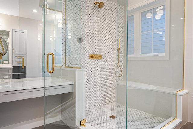 bathroom featuring vanity and a stall shower