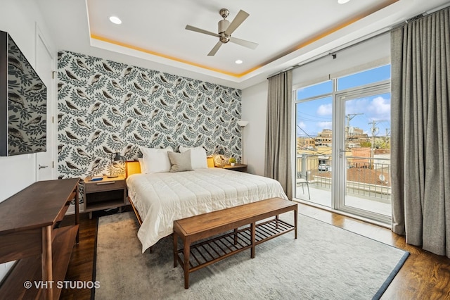 2109 N Campbell Ave Unit 2N, Chicago, IL 60647 - bedroom featuring wood finished floors, access to outside, a raised ceiling, recessed lighting, and ceiling fan