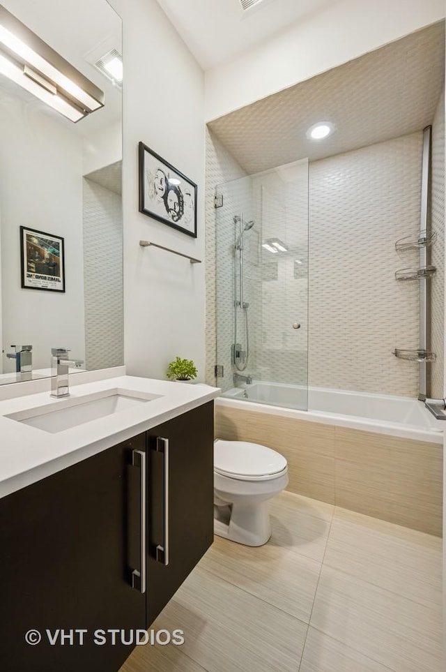 2109 N Campbell Ave Unit 2N, Chicago, IL 60647 - bathroom with toilet, tiled shower / bath, vanity, and tile patterned floors