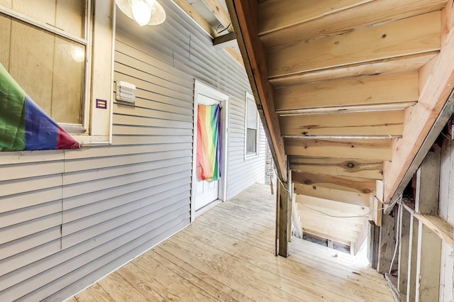 2437 W Taylor St, Chicago, IL 60612 - hallway featuring wood walls and wood finished floors