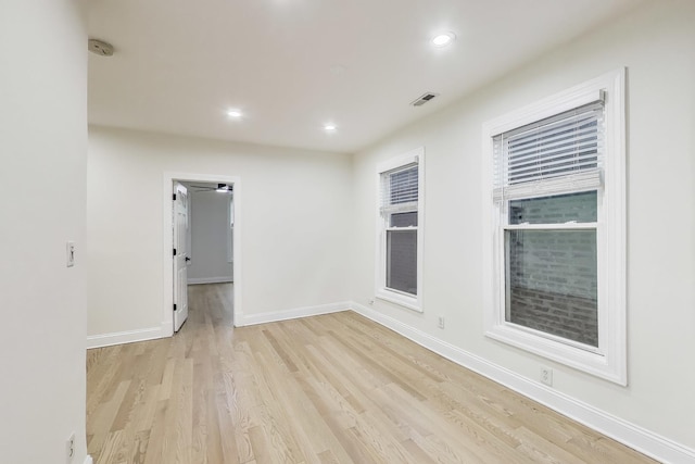 2437 W Taylor St, Chicago, IL 60612 - spare room with a smoke detector, light wood-type flooring, and recessed lighting