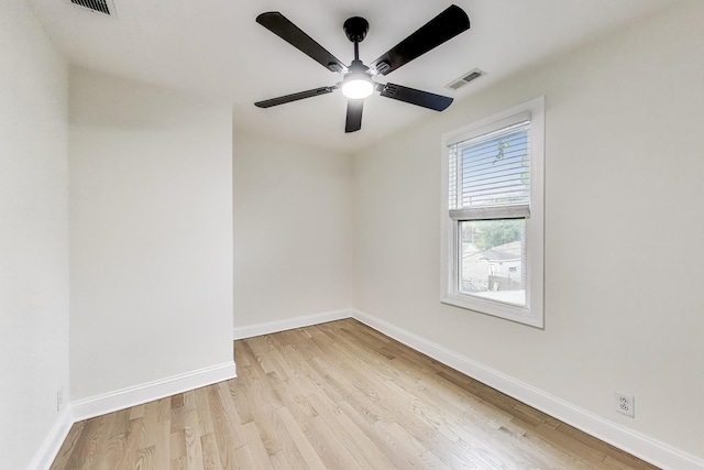 2437 W Taylor St, Chicago, IL 60612 - spare room with wood finished floors and ceiling fan