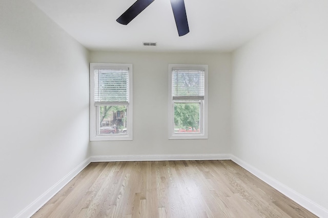 2437 W Taylor St, Chicago, IL 60612 - empty room featuring a ceiling fan and light wood-type flooring