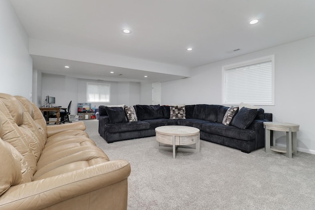 living area with recessed lighting and carpet