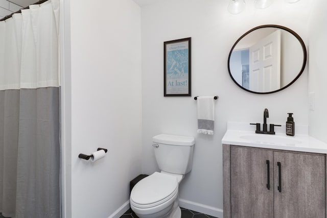 full bath featuring baseboards, vanity, toilet, and curtained shower