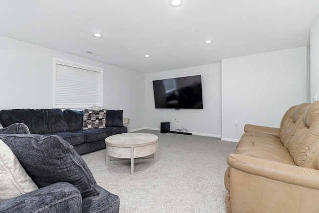 living room with carpet flooring, recessed lighting, and baseboards
