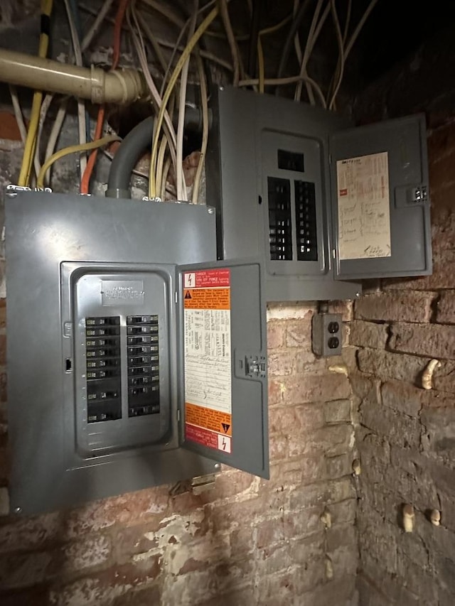 utility room featuring electric panel