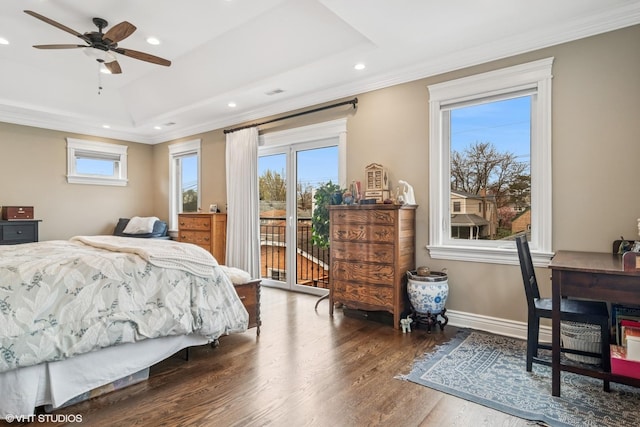 bedroom featuring crown molding, access to exterior, recessed lighting, wood finished floors, and a tray ceiling