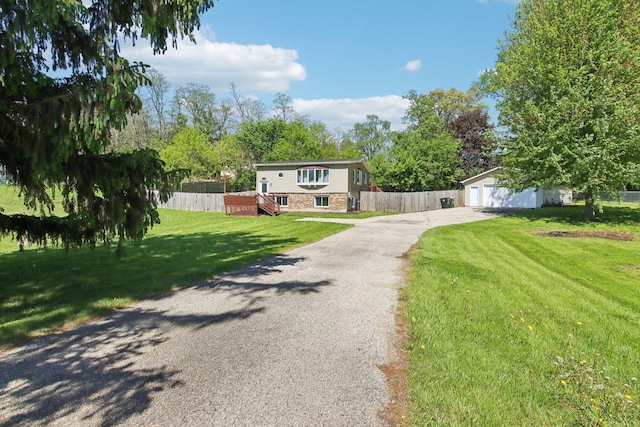 38622 N Drexel Blvd, Antioch, IL 60002 - view of front facade featuring a garage, an outdoor structure, and driveway