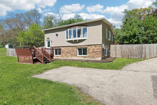 38622 N Drexel Blvd, Antioch, IL 60002 - back of house with a deck and brick siding