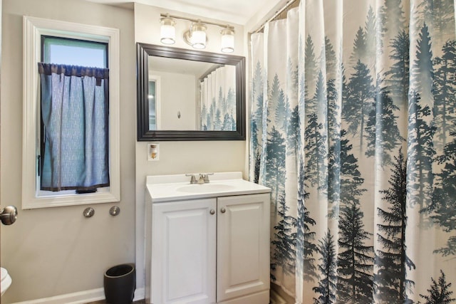 38622 N Drexel Blvd, Antioch, IL 60002 - full bath with vanity, baseboards, toilet, and a shower with curtain