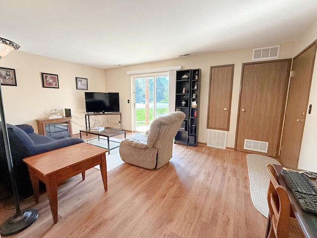 living room featuring light wood-type flooring