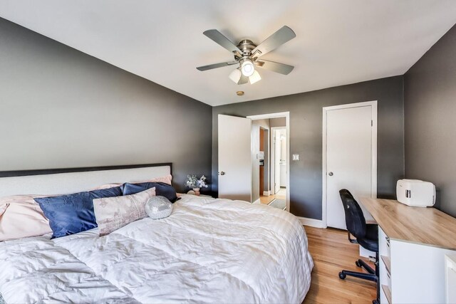 4855 Dobson St Unit 304, Skokie, IL 60077 - bedroom with baseboards, a ceiling fan, and light wood finished floors