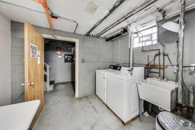 4855 Dobson St Unit 304, Skokie, IL 60077 - laundry room with separate washer and dryer, a sink, concrete block wall, and laundry area