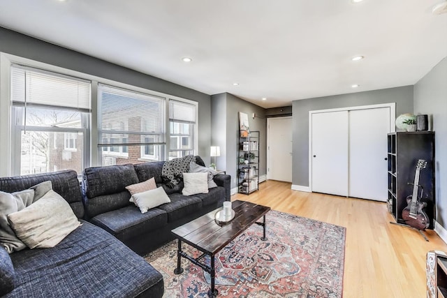 4855 Dobson St Unit 304, Skokie, IL 60077 - living room featuring recessed lighting, baseboards, and light wood finished floors