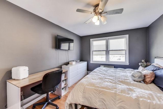 4855 Dobson St Unit 304, Skokie, IL 60077 - bedroom featuring light wood-type flooring and a ceiling fan