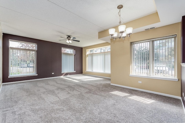855 E 22nd St Unit 105, Lombard, IL 60148 - carpeted spare room featuring baseboards, visible vents, and ceiling fan with notable chandelier