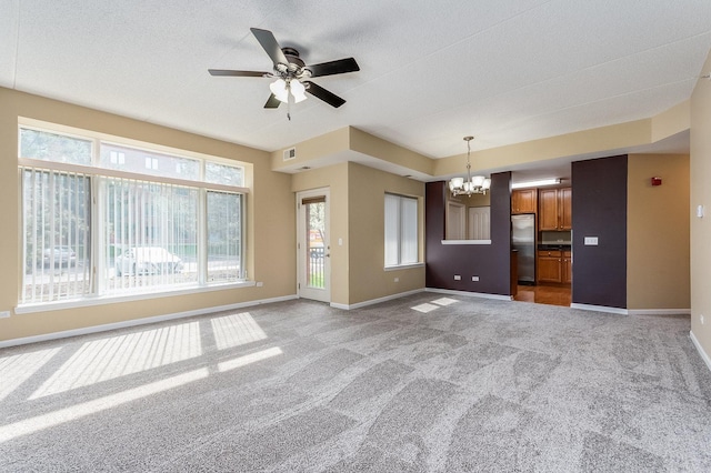855 E 22nd St Unit 105, Lombard, IL 60148 - unfurnished living room with visible vents, baseboards, light colored carpet, and ceiling fan with notable chandelier