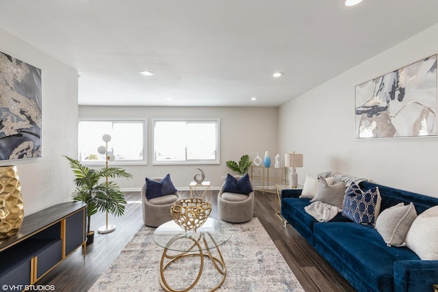 living area featuring recessed lighting and dark wood-style floors