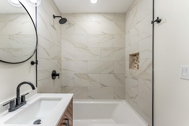 bathroom with vanity, recessed lighting, and a shower
