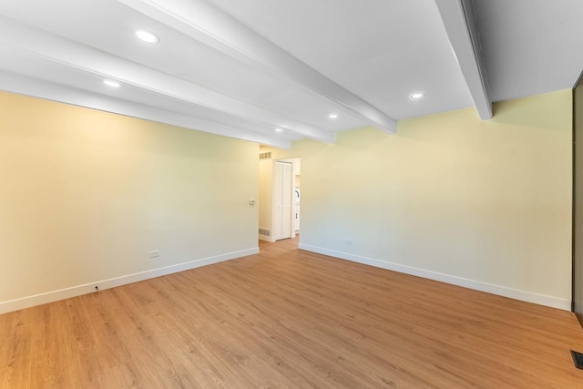 interior space featuring baseboards, recessed lighting, light wood-style flooring, and visible vents