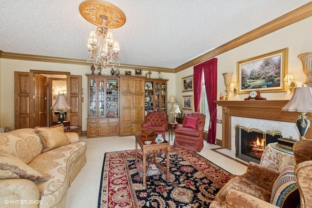 living room featuring light carpet, a fireplace, ornamental molding, and a chandelier