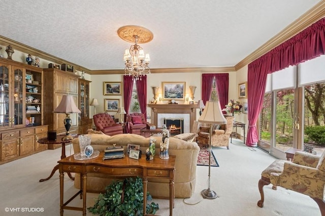 living area featuring light colored carpet, plenty of natural light, a lit fireplace, and an inviting chandelier