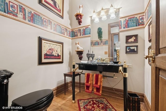821 Chatfield Rd, New Lenox, IL 60451 - sitting room with wood finished floors, baseboards, and bar area