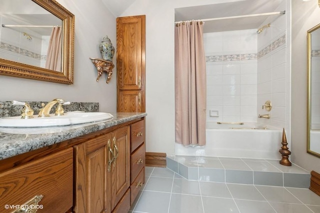 bathroom featuring shower / bath combo with shower curtain, tile patterned flooring, and vanity