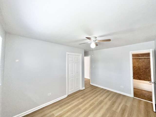 767 May St, Calumet City, IL 60409 - unfurnished bedroom featuring baseboards and a closet