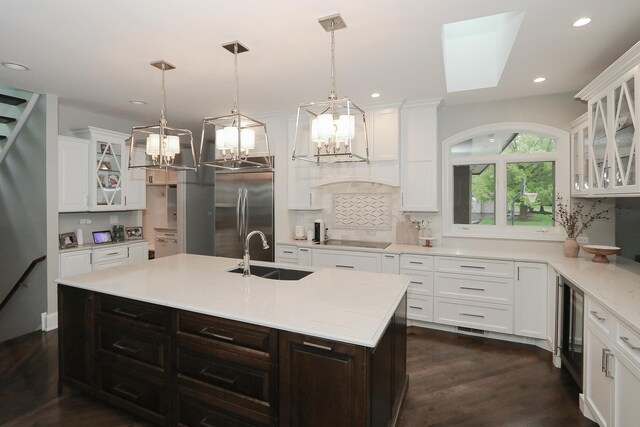 67 Katrina Ln, Sleepy Hollow, IL 60118 - kitchen featuring stainless steel built in fridge, a chandelier, a sink, backsplash, and recessed lighting