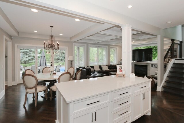 67 Katrina Ln, Sleepy Hollow, IL 60118 - kitchen with open floor plan, light countertops, a chandelier, white cabinets, and recessed lighting