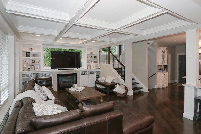 67 Katrina Ln, Sleepy Hollow, IL 60118 - living room featuring decorative columns, stairway, a glass covered fireplace, dark wood finished floors, and coffered ceiling