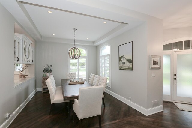 67 Katrina Ln, Sleepy Hollow, IL 60118 - dining space with dark wood finished floors, a chandelier, baseboards, a raised ceiling, and recessed lighting