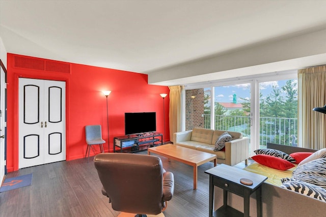 living area with dark wood-type flooring