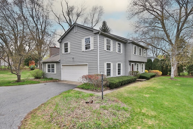 202 Heath Ct, Barrington, IL 60010 - view of side of property with a garage, a chimney, a yard, and aphalt driveway