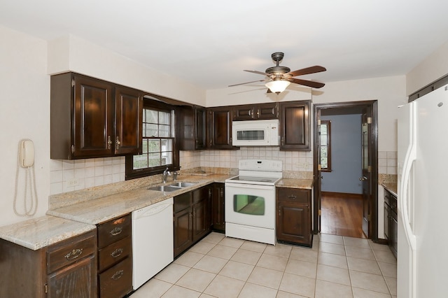 202 Heath Ct, Barrington, IL 60010 - kitchen with dark brown cabinets, a sink, white appliances, light countertops, and tasteful backsplash
