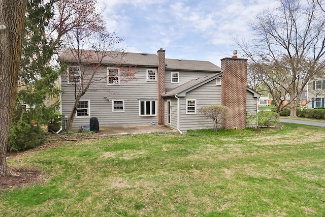 202 Heath Ct, Barrington, IL 60010 - rear view of property with a yard, a chimney, and a patio area