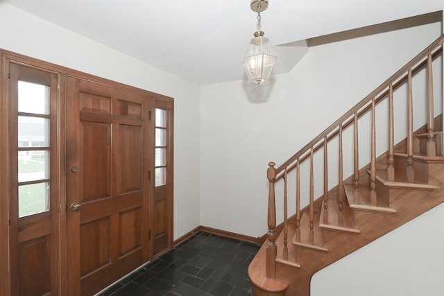 202 Heath Ct, Barrington, IL 60010 - foyer with stairway, baseboards, an inviting chandelier, and stone finish flooring