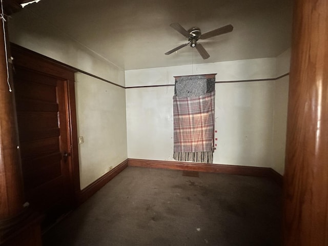 801 S Warren St, Peoria, IL 61605 - empty room featuring a ceiling fan and baseboards