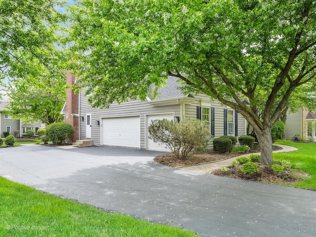 1301 Hawkins Ct, Saint Charles, IL 60174 - view of front of house featuring driveway and a shingled roof