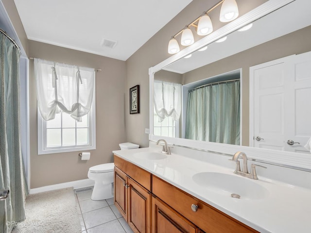 1301 Hawkins Ct, Saint Charles, IL 60174 - full bath with tile patterned floors, toilet, baseboards, and a sink