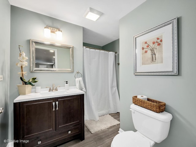 1301 Hawkins Ct, Saint Charles, IL 60174 - bathroom with toilet, curtained shower, wood finished floors, and vanity